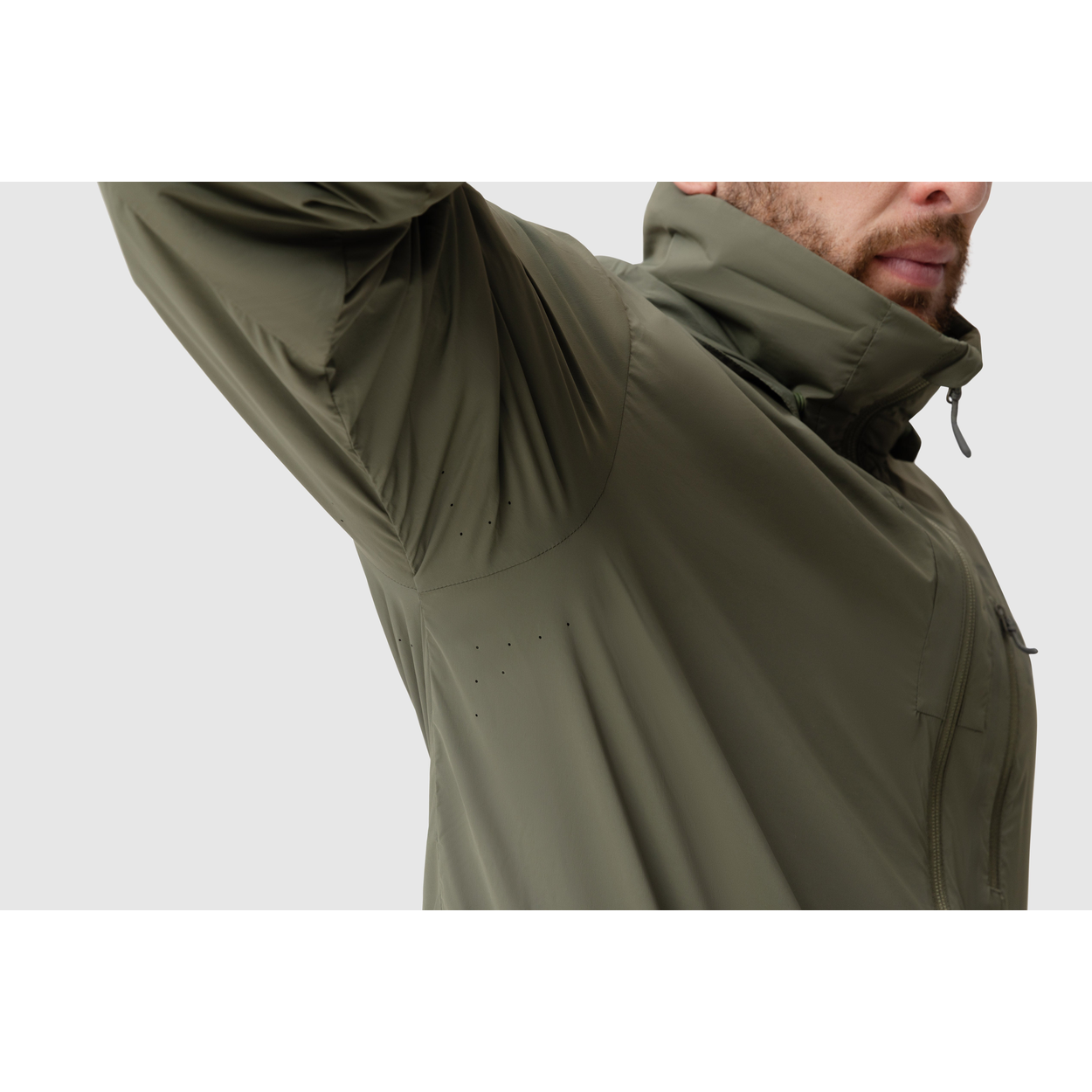 Close-up photo of the Tomahawk Performance Crosswind Jacket's underarm laser perforation for ventilation.